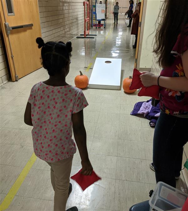  Student playing Beanbag Toss